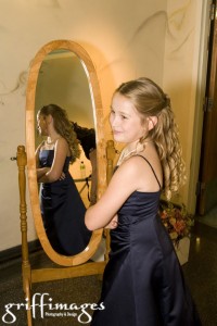 Junior bridesmaid in mirror.