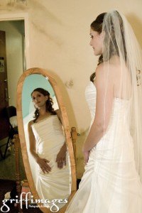 Bride in mirror.